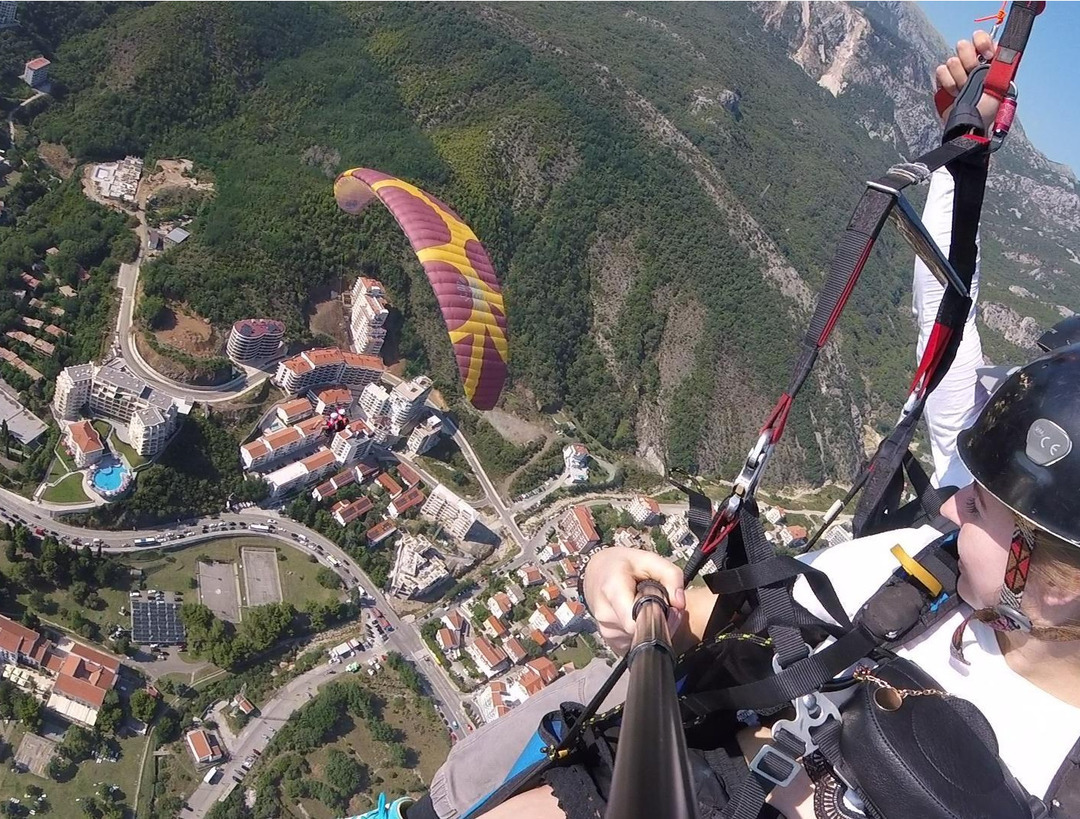 Budva’s Festive Buzz, Bypass Plans, and Paragliding Joy
