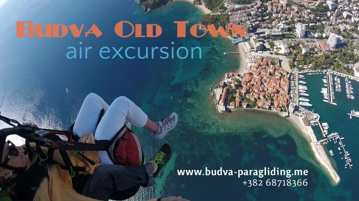 Budva Old Town and coastline from a paragliding view.