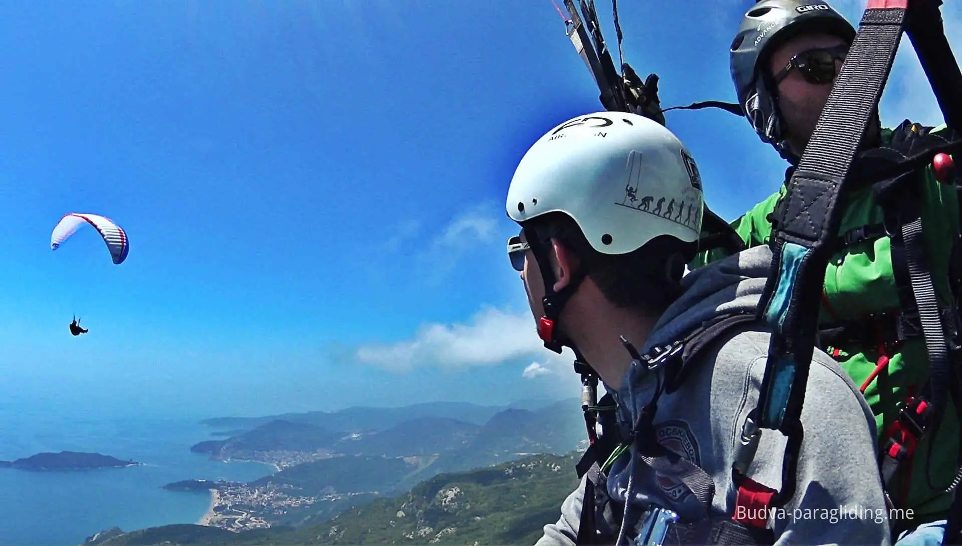 Wide Budva Riviera coastline seen during tandem paragliding.